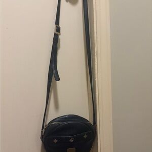 MCM Black Crossbody Bag with Gold Accents